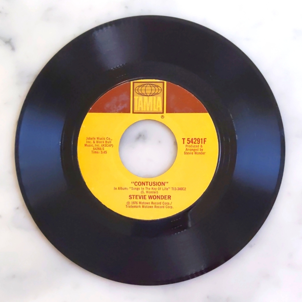 Vintage 1976 Stevie Wonder: Contusion and AS.